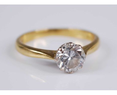 An 18ct gold diamond solitaire ring, the eight-claw set round brilliant cut diamond weighing approx 1.05 carats, colour asses