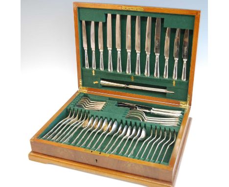 An Elizabeth II cased silver cutlery suite, in the Louis XVI pattern, comprising six table forks, six table knives with steel