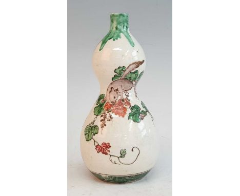 A Japanese Meiji period earthenware vase, of double gourd form, enamel decorated with a mouse amongst foliage, two character 