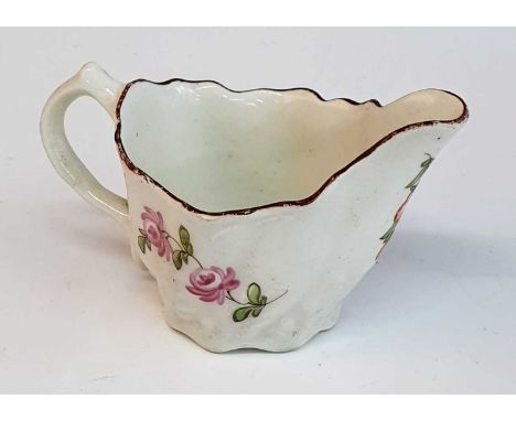A circa 1780 Lowestoft porcelain 'Chelsea ewer' sauce boat, enamel decorated with flowers, h.5.5cm Approx. 2cm hairline acros