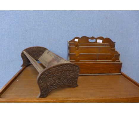 A Victorian walnut letter rack and a carved wood book trough 