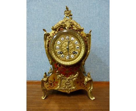 A 19th Century French Boulle mantel clock, the movement signed Medaille D'argent 