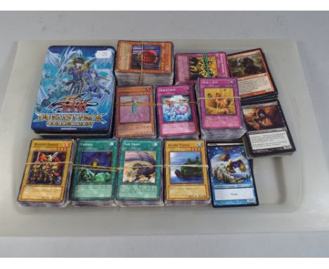 A Collection of Approximately 750 Konami, Yu-Gi-Oh! And Magic The Gathering Trading Cards
