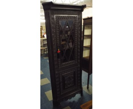 A Late 19th Century Carved Oak Double Free Standing Corner Cabinet with Glazed Top Section to Shaped Shelf Interior to Cupboa