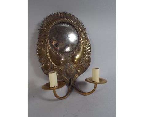 An Arts and Crafts Wall Light Fitting with Mirror with Relief Sunburst Decoration. Two Branch Light Fitting 43cm High 