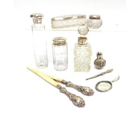 A LATE VICTORIAN SMALL SILVER SCENT BOTTLE HOLDER by H. Matthews, Birmingham 1899, with glass scent bottle; with a glass scen