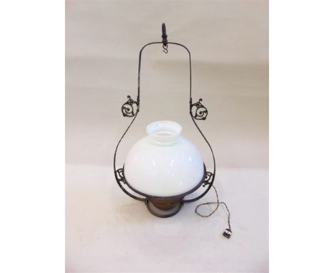 A VICTORIAN HANGING OIL LAMP  with brass burner and opaque glass shade, converted to electricity, 83cm high overall, the shad