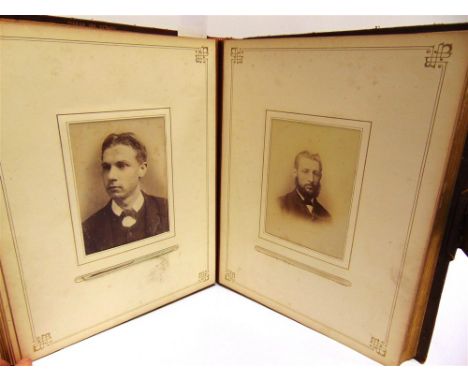 A 19TH CENTURY PHOTOGRAPH ALBUM comprising approximately forty-one carte-de-visite and eight cabinet portrait photographs, le