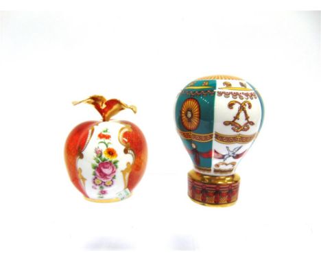 A ROYAL WORCESTER ZODIAC CANDLE SNUFFER  Up Up & Away, limited edition No 202/500, and another in the form of an apple (both 