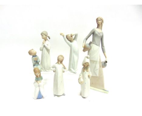 A GROUP OF SIX ASSORTED LLADRO AND NAO FIGURES,  the tallest, a girl holding two jugs (a/f) 39.5cm high