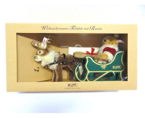 A STEIFF FATHER CHRISTMAS TEDDY BEAR WITH REINDEER limited edition 845/2500, with certificate of authenticity, boxed.