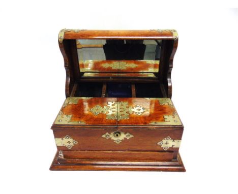 A LATE VICTORIAN EP MOUNTED OAK TANTALUS CABINET,  with recess for three decanters and pair of doors opening to fitted compar