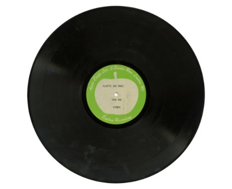 A double sided 12 inch acetate for the 1970 Yoko Ono/Plastic Ono Band self-titled album. It is on the Apple Corps Ltd. 3 Savi