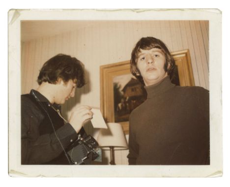 An original vintage sixties personal photograph of John Lennon and Ringo Starr taken in 1965. The image has been mounted onto
