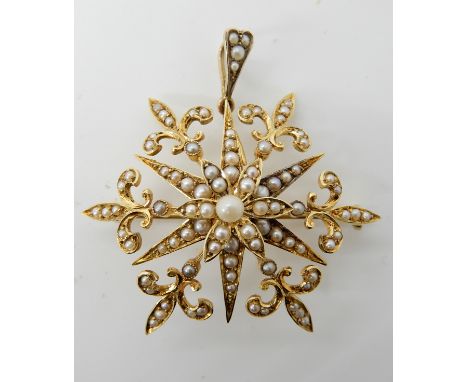 A 15ct gold Victorian starburst pendant brooch, 4.5cm x 4cm, weight 9gms, in original fitted box Condition Report: Available 