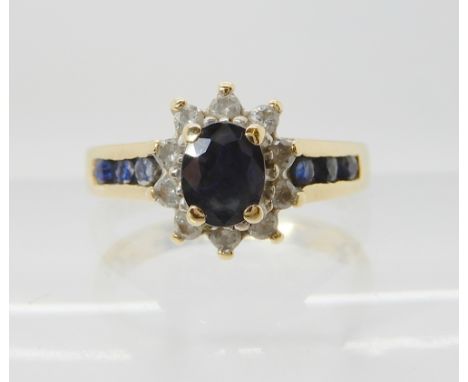 A 9ct gold sapphire and diamond ring, finger size J, weight 2.5gms Condition Report: Available upon request