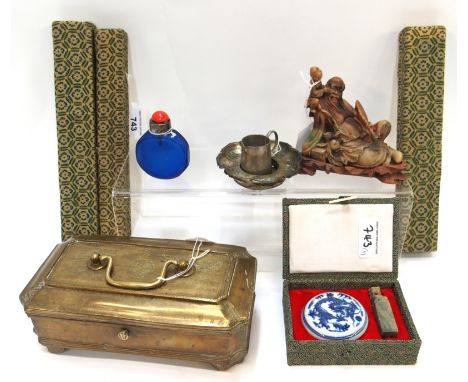 Three cased sets of Chinese chopsticks, a cased soapstone seal and porcelain ink pot, resin figure group on wood stand, white