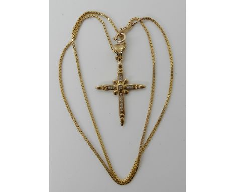 A 9ct gold diamond set cross and chain, weight approx 5.3gms Condition Report: Available upon request