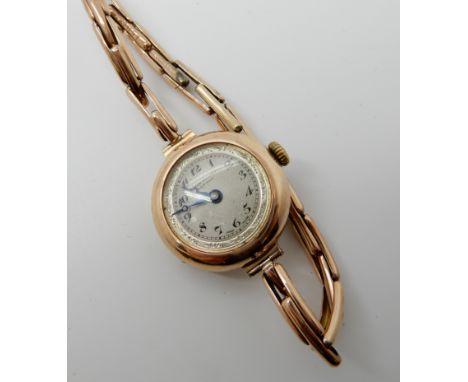 A 9ct gold ladies vintage watch weight including mechanism 19.4gms Condition Report: Available upon request