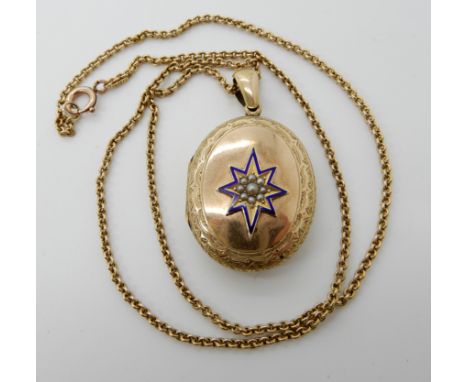 A yellow metal vintage locket with a blue enamel and pearl set star, dimensions 4.3cm x 2.5cm, and a 15ct gold chain, length 