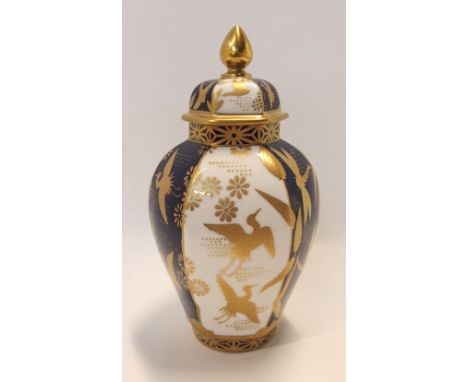 A limited edition boxed Royal Worcester Japanesque vase, no 40/250, 19cm high Condition Report: Available upon request