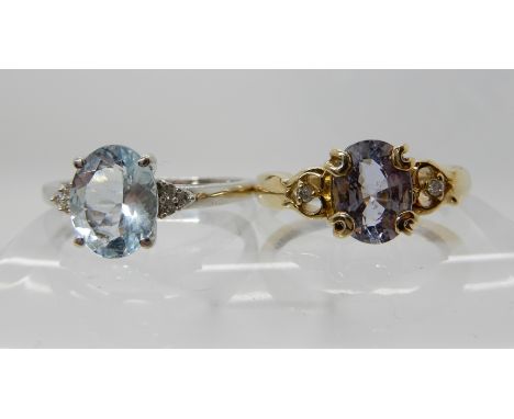 A 9ct white gold aquamarine and diamond ring, size Q1/2, a 9ct amethyst and diamond ring, size K, weight 4.9gms Condition Rep