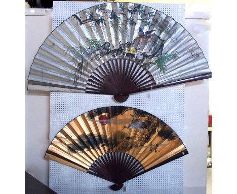 Two large Chinese fans and a scroll decorated with Geishas