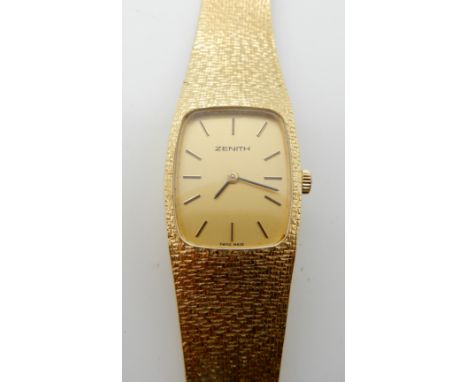 An 18ct gold Zenith lady's watch, 17.5cm long, weight 50.1gms including mechanism, with Martin's of Glasgow warranty to 14th 