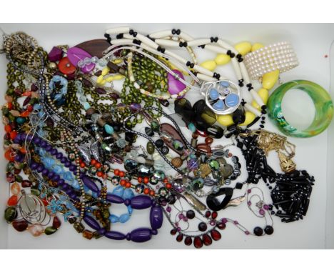 A bag full of vintage costume jewellery to include a bangle in the style of Sobral Condition Report: Condition report not ava