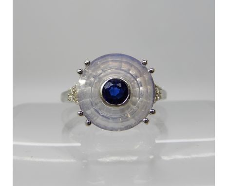 A 9ct white gold 'Torus cut' lavender quartz, kyanite and diamond ring. The Torus cut was created by Glenn Lehrer a world ren