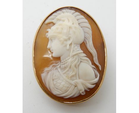 A 9ct gold mounted shell cameo brooch of a female warrior, 3.4cm, weight 6.6gms Condition Report: Available upon request