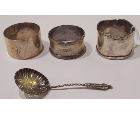 A silver sifter ladle, Birmingham 1905 and three assorted napkin rings Condition Report: Available upon request