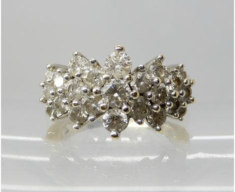 A 14ct gold diamond cluster ring of estimated approx 1.50cts finger size O, weight 7.6gms Condition Report: Mount all good, g