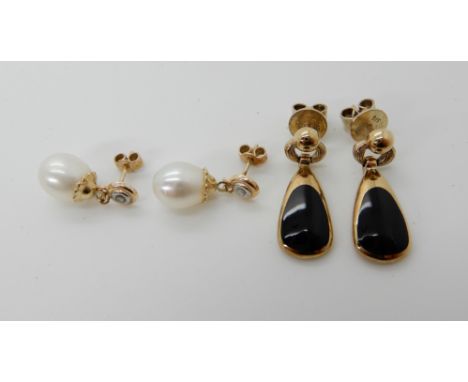 A pair of 9ct gold onyx set earrings together with a pair of pearl and diamond drop earrings, weight 6.4gms Condition Report: