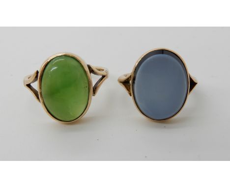 A 9ct gold Chinese green hardstone ring, size Q1/2, and a yellow metal ring set with a banded agate size J1/2, 7gms for both 