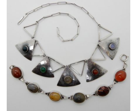 A Scottish pebble bracelet by Ola Gorie stamped OMG to the reverse, and a Israeli silver necklace of triangular panels set wi