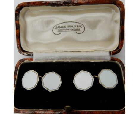 A pair of 9ct and 18ct gold mother of pearl cufflinks, weight approx 5.3gms Condition Report: Available upon request