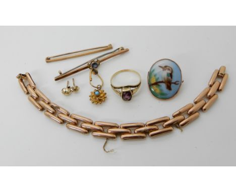A collection of gold and yellow metal items Condition Report: Available upon request