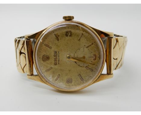 A 9ct gold Rolex Precision wristwatch with gold plated strap, diameter of bezel 3cm, weight with strap and mechanism 48.2gms 