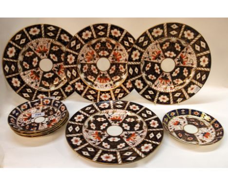 Four Royal Crown Derby plates, pattern number 2451, 27cm diameter, four bowl and a large saucer (9) Condition Report: Availab