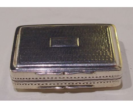 A silver vinaigrette by Edward Smith, Birmingham 1822, of rectangular form with engine turned decoration Condition Report: Av