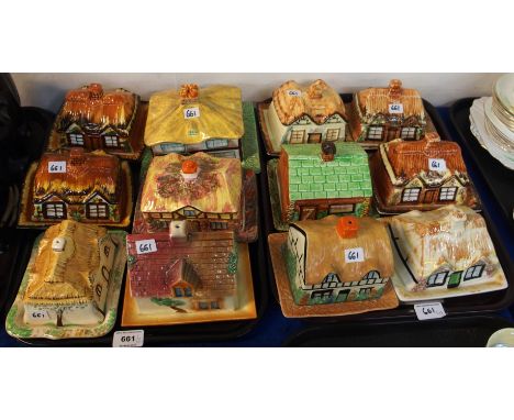 A collection of pottery cottage butter dishes and covers, including Kensington, Melba etc Condition Report: Available upon re