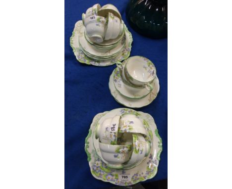 A Paragon Wild Violets tea set comprising ten cups, eleven saucers, ten plates, two cake plates and a sugar bowl Condition Re