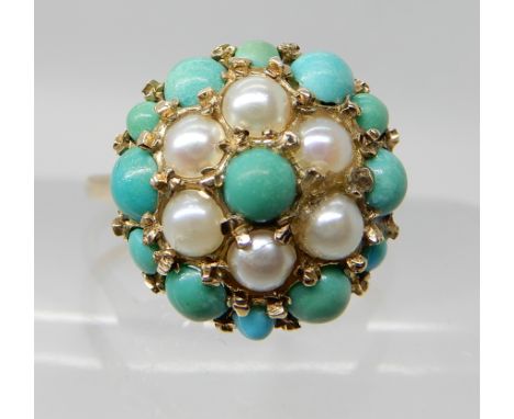 A 9ct gold turquoise and pearl set cluster ring, finger size V, weight 5.7gms Condition Report: Available upon request