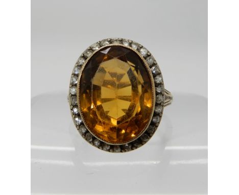 A yellow metal citrine and rose cut diamond ring, size approx M, weight 7.5gms Condition Report: Available upon request