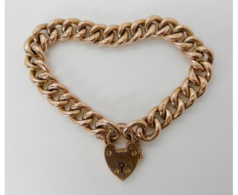 A 9ct gold curb link bracelet, stamped 9c to every link with a 9ct gold heart shaped clasp, length 18cm, weight approx 18.5gm