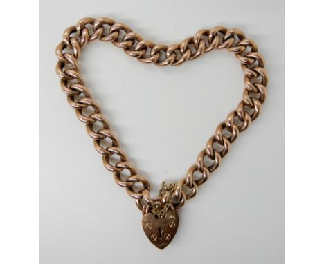 A 9ct rose gold curb link bracelet with a heart shaped clasp, length approx 19cm, weight 9.7gms Condition Report: Available u