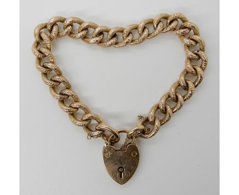 A 9ct gold curb link bracelet with heart shaped clasp length 19cm, weight approx 16.9gms Condition Report: Available upon req
