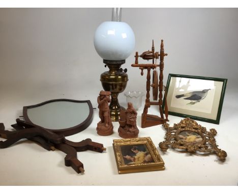A Vintage Veritas oil lamp H:54cm also with a miniature spinning wheel, two terracotta figures and other items 