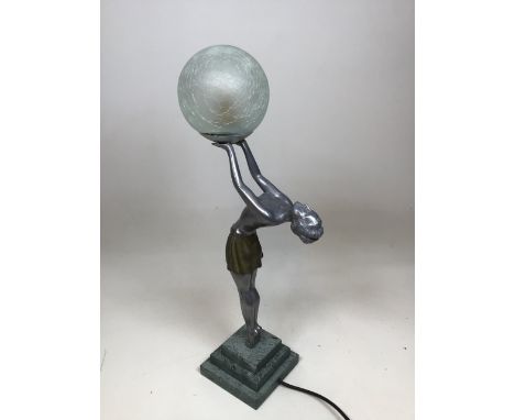 An art deco style figural lamp of skirted lady holding a glass ball H:55cm  Overall height